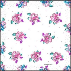 A square fabric with a white background features repeated floral patterns of pink roses with teal and purple leaves surrounded by small colored dots creating a vibrant  decorative design.