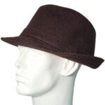 A brown fedora hat sits on the head of a mannequin with a smooth white face highlighting the hat's shape and texture against a simple background.