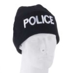 A black beanie hat labeled POLICE rests on a white mannequin head against a plain background  indicating a connection to law enforcement or security.