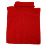 A red turtleneck sweater is neatly folded with the collar upright. It is displayed on a plain background  showcasing its texture and vibrant color.