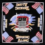 A large red truck is centered  facing forward  surrounded by text that reads trucking along driving long and hard  with alternating blue and red flags in the corners against a black background.