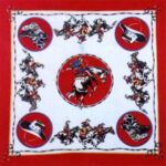 A square decorative textile features illustrations of cowboys on horseback and cowboy hats set against a red background with circular accents highlighting various motifs of the cowboy theme