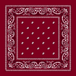 A maroon fabric bandana features intricate white paisley and floral patterns along the borders with small white teardrop shapes scattered throughout the central area.
