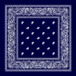A navy bandana features intricate white paisley designs along the edges with smaller white paisley shapes scattered throughout the center creating a symmetrical decorative pattern.