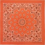 A square bandana featuring intricate white paisley patterns and a central starburst design on an orange background  often used as a fashion accessory or for practical purposes.