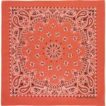 A square bandana with a decorative paisley pattern in shades of orange and black is displayed flat  showcasing intricate designs around a central starburst motif.