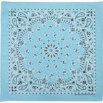 A light blue bandana features intricate paisley and floral designs in black and white surrounding a central star motif creating a decorative textile suitable for fashion or practical use.