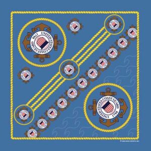 A blue fabric features circular emblems of the United States Coast Guard with anchors and ropes  arranged in a pattern across the surface  conveying a nautical theme.