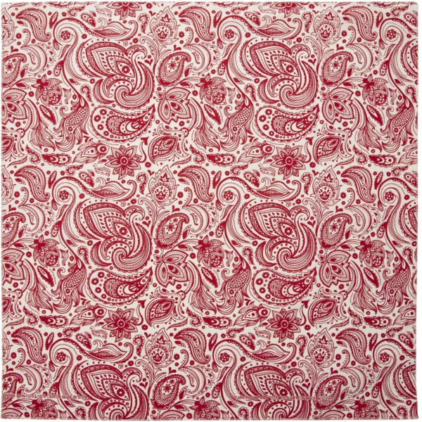 Red and white paisley patterned fabric showcases intricate swirls and floral designs creating a vibrant textile suitable for various decorative uses in home decor or fashion projects.