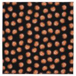 A black fabric features numerous repeating orange pumpkins with various carved faces  creating a festive and playful Halloween pattern across the surface  suitable for decorations or clothing.