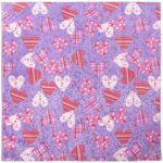 A patterned fabric features various heart shapes in red pink and white against a purple background with a subtle texture showcasing polka dots stripes and patches arranged randomly across the surface.