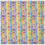 A patterned fabric features vibrant flowers in pink and purple surrounded by colorful green and blue vines on a bright yellow background creating a lively  cheerful aesthetic.