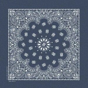 A square blue bandana features intricate white paisley and floral patterns radiating from a central star-like design creating a symmetrical and decorative appearance suitable for traditional or casual use.