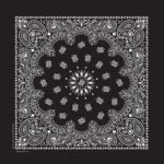 A black bandana features intricate white patterns including paisley designs and floral motifs arranged symmetrically creating a decorative textile suitable for fashion or cultural uses.