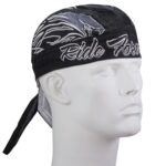 A black bandana with a graphic design is worn on a white mannequin head showing the phrase Ride Free prominently displayed on the front with long ties at the back.