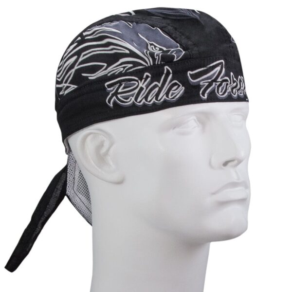 A black bandana with a graphic design is worn on a white mannequin head showing the phrase Ride Free prominently displayed on the front with long ties at the back.