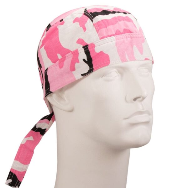A pink camouflaged bandana is displayed on a mannequin head the bandana features black accents and ties at the back creating a stylish functional look suitable for various activities