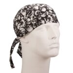 A black and white bandana with skull patterns is worn on a mannequin head  displaying its design and style against a neutral background  showcasing a fashion accessory often used for practical or aesthetic purposes.