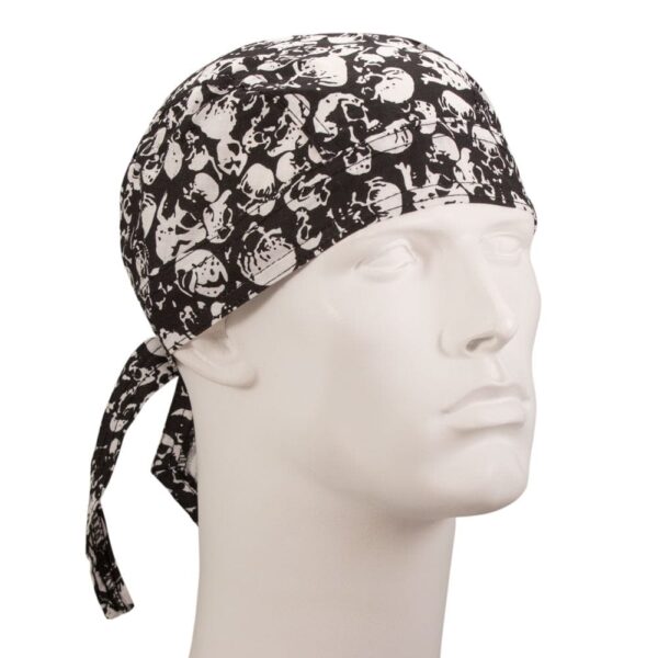 A black and white bandana with skull patterns is worn on a mannequin head  displaying its design and style against a neutral background  showcasing a fashion accessory often used for practical or aesthetic purposes.