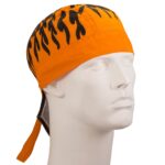 A bright orange bandana with black flame designs is placed on a white mannequin head facing slightly to the right in a neutral background