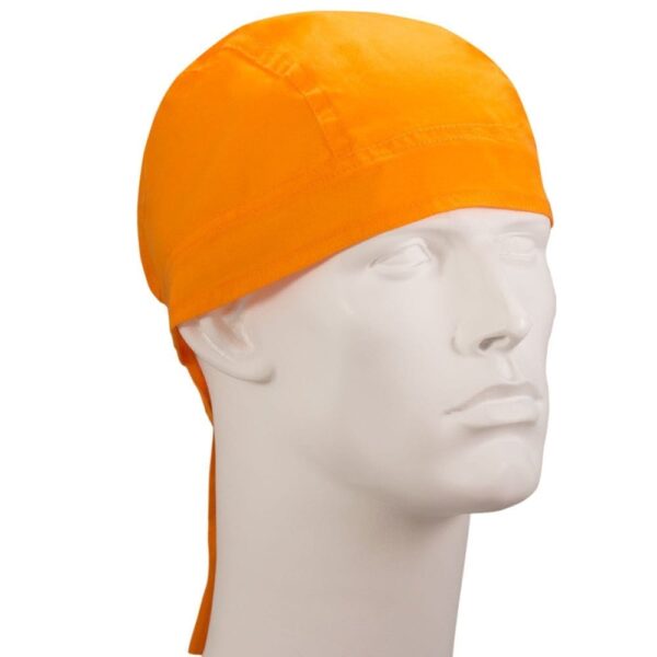 An orange head covering sits on a stylized mannequin head facing slightly to the side in a neutral setting showcasing the texture and color of the fabric.