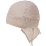 A beige cotton headscarf is displayed upright showcasing its smooth texture and stitched edges with long ties hanging down from the back providing a practical style for outdoor wear.
