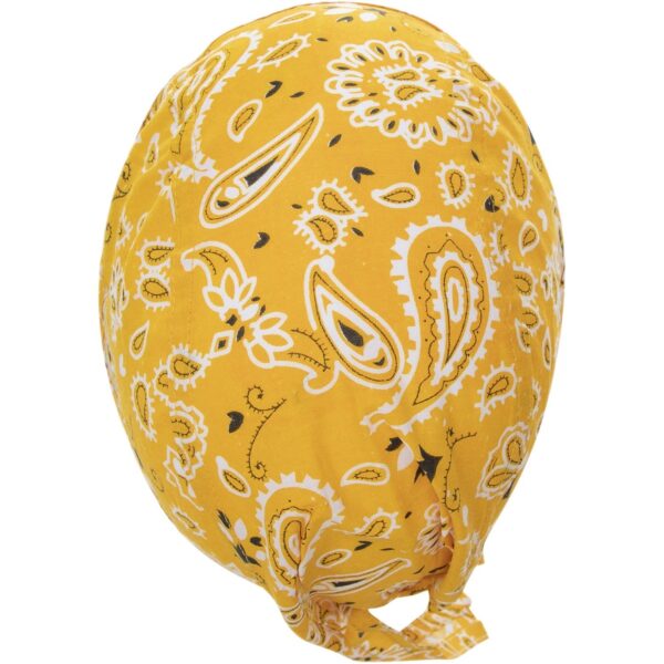 A yellow bandana featuring a white paisley pattern is tied in a knot at one end resting on a flat surface showcasing its vibrant color and intricate design.