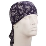 A black bandana with white paisley patterns adorns a mannequin head showcasing its design and style in a neutral display setting without additional distractions or context.