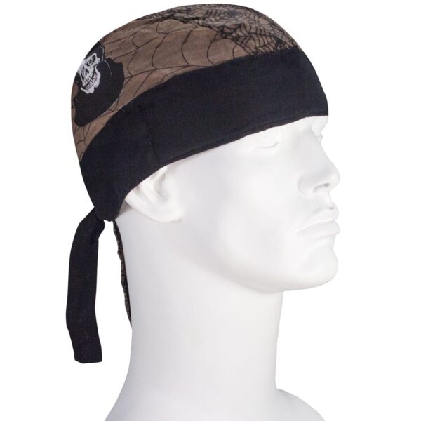 A black and brown bandana featuring a spider web design and a skull is tied around the head of a white mannequin  styled to resemble a person.