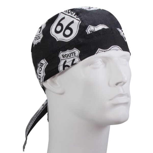 A black bandana with white Route 66 signs is tied around the head of a mannequin displaying the pattern prominently against a neutral background.