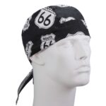 A black bandana features a patterned design of road signs with "ROUTE 66" and "66" prominently displayed wrapped around the head of a white mannequin in a neutral backdrop.