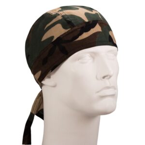 A camouflage bandana is displayed on a white mannequin head facing slightly to the right with the ties hanging down the side against a plain background.