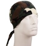 A camouflage bandana is worn on a mannequin's head with trailing ties at the back against a plain backdrop  emphasizing its design and fit for outdoor or tactical use.