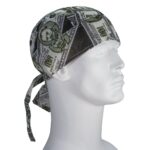 A headband featuring a design of dollar bills is worn on a mannequin's head with the ties hanging down the side in a plain background.