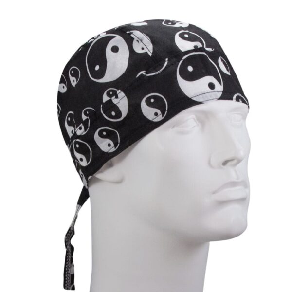 A black bandana with white yin-yang symbols is worn on the head of a white mannequin bust facing slightly to the right against a plain background.