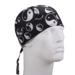 A black bandana with white yin-yang symbols is worn on the head of a mannequin's face angled to the side in a plain background showcasing the design and pattern clearly.