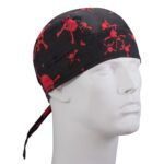 A black bandana with red skull and crossbones patterns is worn on a mannequin's head emphasizing a rebellious or edgy style in a neutral display environment.