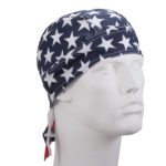 A bandana featuring a navy blue background with white stars is displayed on a mannequin's head showcasing its design in a neutral setting emphasizing the pattern without distractions.