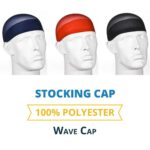 Three mannequin heads wear different colored stocking caps in dark blue  red  and black. Text labels the caps as "Stocking Cap 100% Polyester Wave Cap" on a white background.