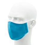 A blue fabric mask is positioned on a white mannequin head showcasing the mask's structure and color in a neutral background highlighting its design and purpose for face covering.