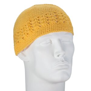 A crocheted yellow hat sits on a stylized mannequin head facing slightly to the left showcasing a textured design with an open weave pattern against a plain background.