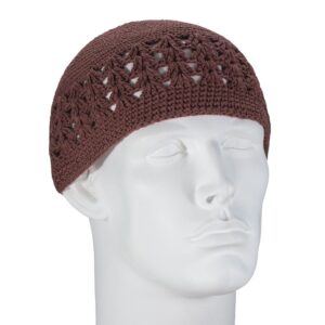 A brown crocheted beanie with an open lace pattern is positioned on a white mannequin head facing forward in a neutral setting. The beanie fits snugly  showcasing its design.