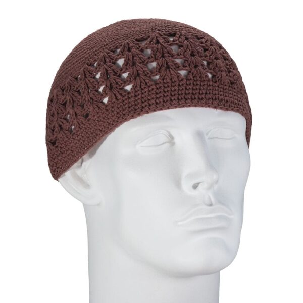A brown crocheted beanie with an open lace pattern is positioned on a white mannequin head facing forward in a neutral setting. The beanie fits snugly  showcasing its design.